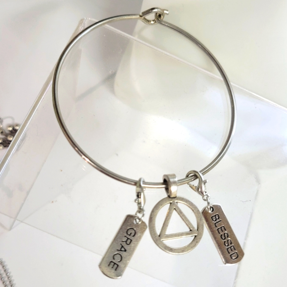 BANGLE BRACELET BLESSED GRACE AND THE AA UNITY SYMBOL.